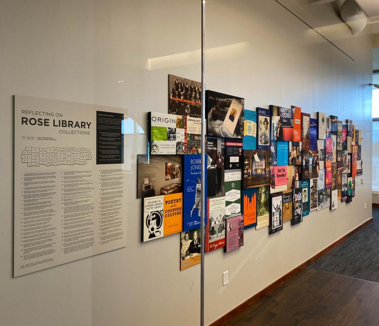 Rose Library's reading room collage wall display located on Level 10 of  Woodruff Library, designed by John Klingler