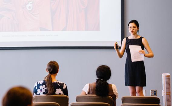 Woman presenting to a class