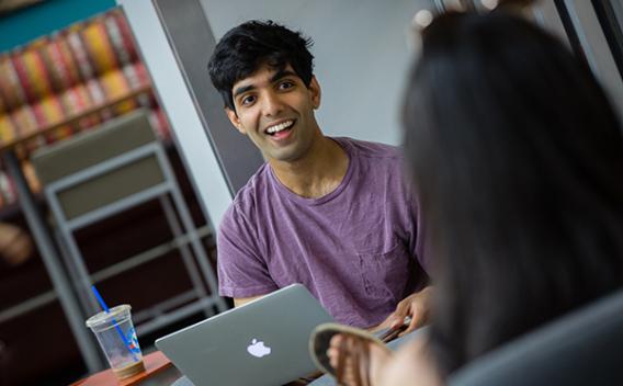 Students in conversation on Level 1 of Woodruff Library