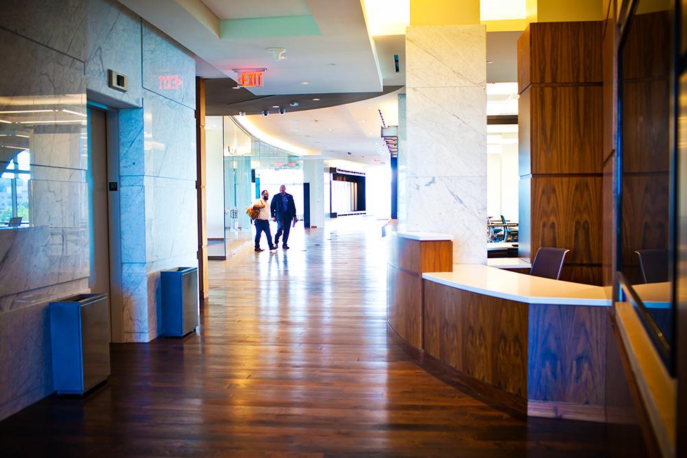 Interior of the Rose Library, including the elevators and service desk.