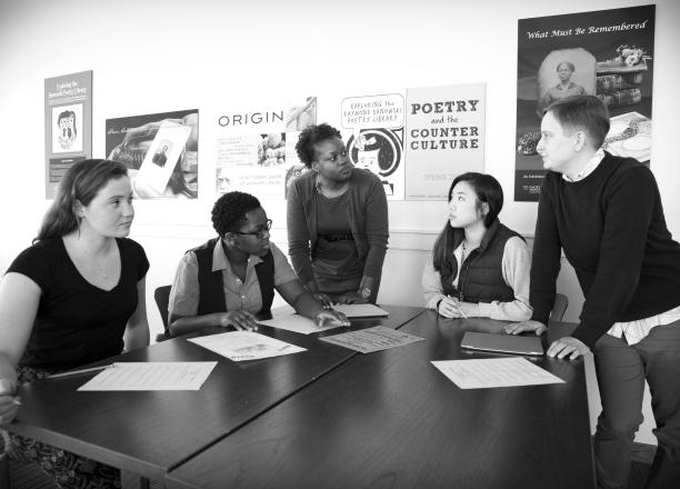 Donna Troka (standing at left), American Studies adjunct assistant professor, and Gabrielle Dudley, Rose Library instruction archivist and QEP librarian, help students in Troka’s "Resisting Racism" spring semester class work with the library’s civil rights collections. Emory Photo/Video.